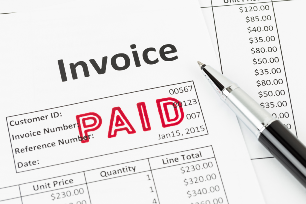 A paid invoice with other financial data