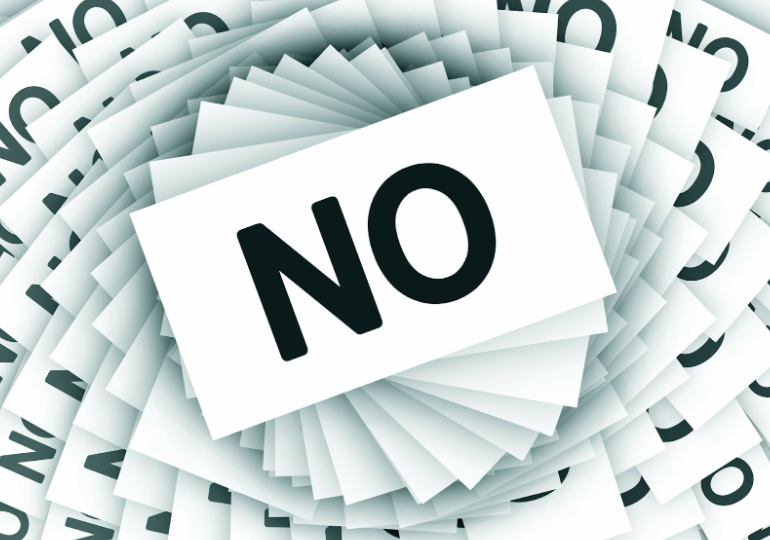 a stack of cards that say 'no'