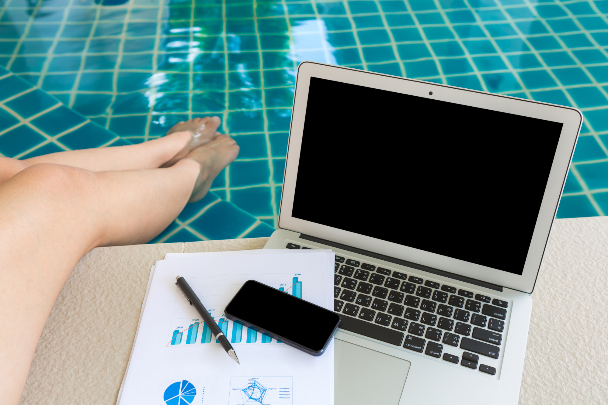 woman working by a pool
