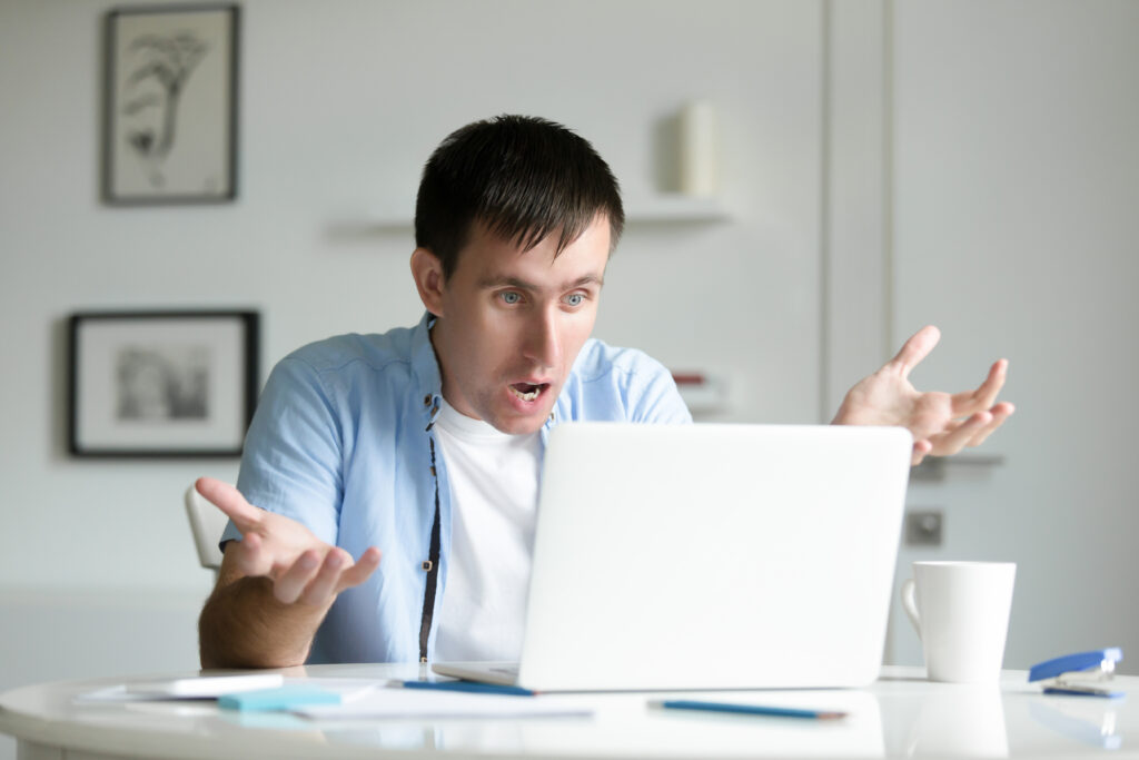 man having a conflict while working remotely