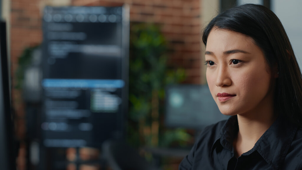 Asian woman doing software development 