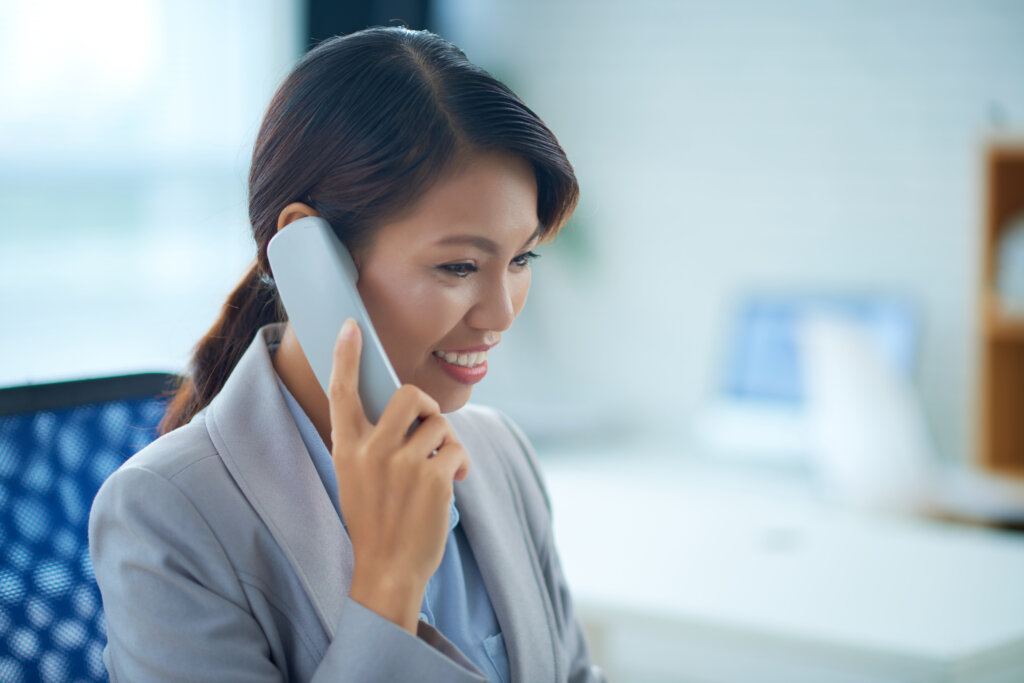 Asian virtual assistant on the phone