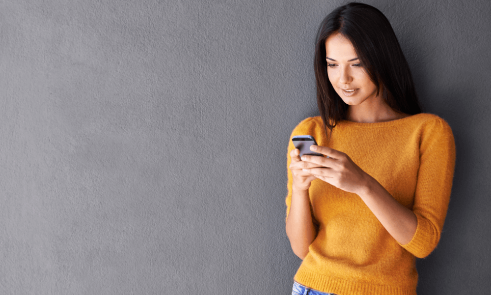 Woman looking at social media on her phone