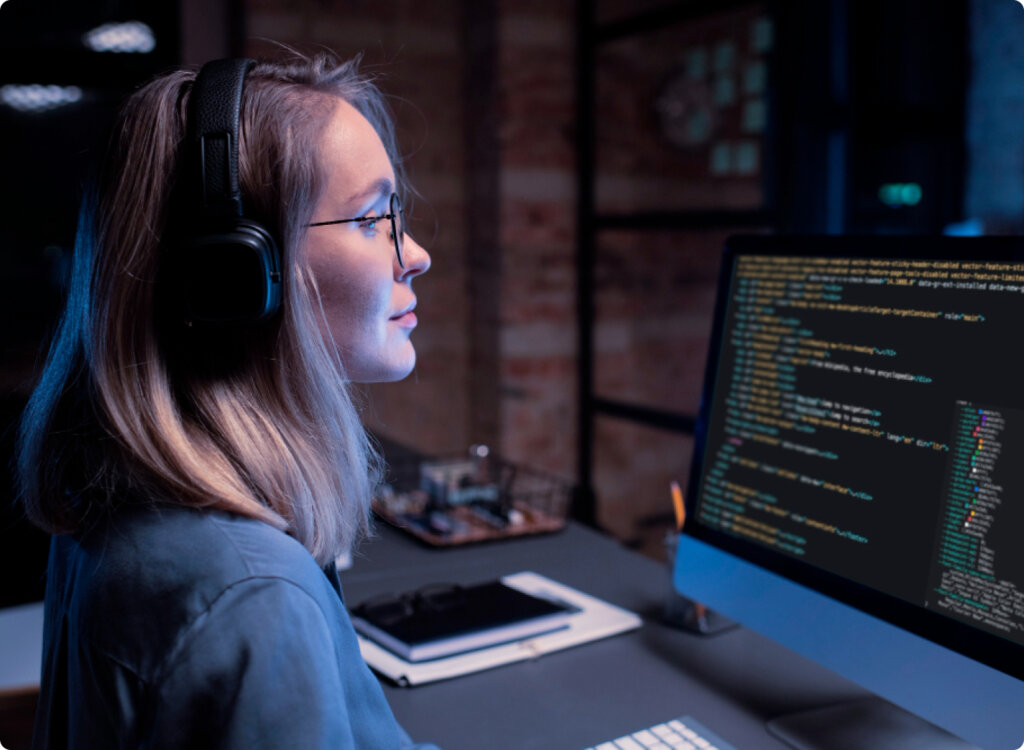 website designer looking at a computer