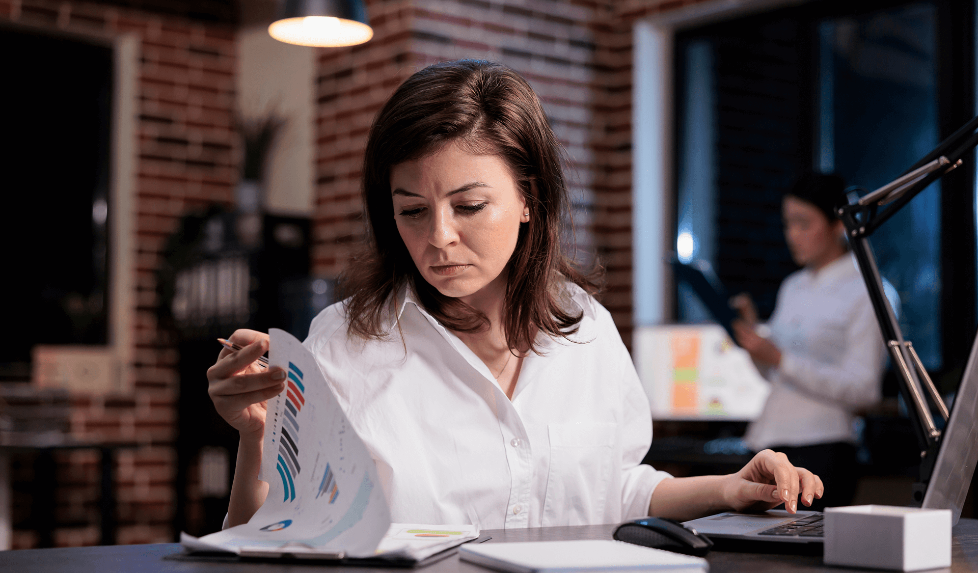 Executive director appearing overwhelmed in a high-pressure setting